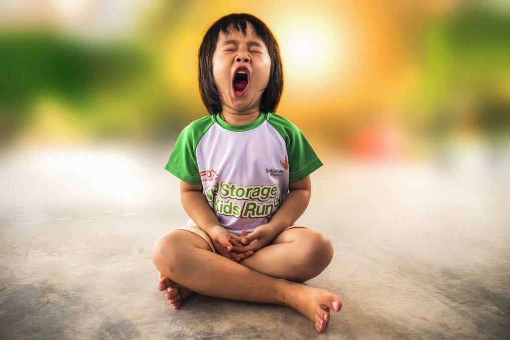 Cannabinoids 101: What Makes Cannabis, Cannabis? | Cannabis 101 | My Supply Co. A child yawns in cross-legged position.