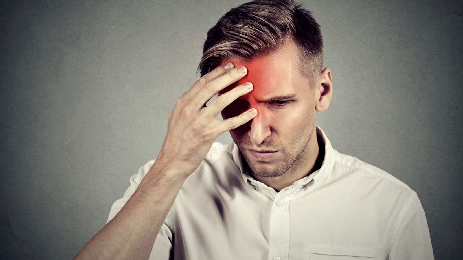 A man's head throbs with a headache to indicate inflammation