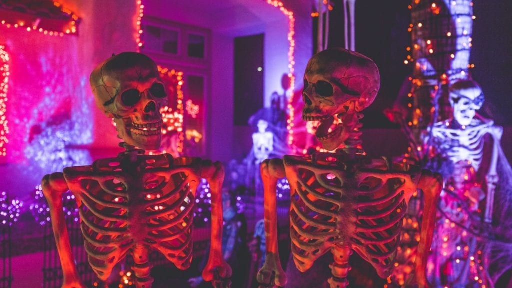 Skeletons celebrate Halloween at a party