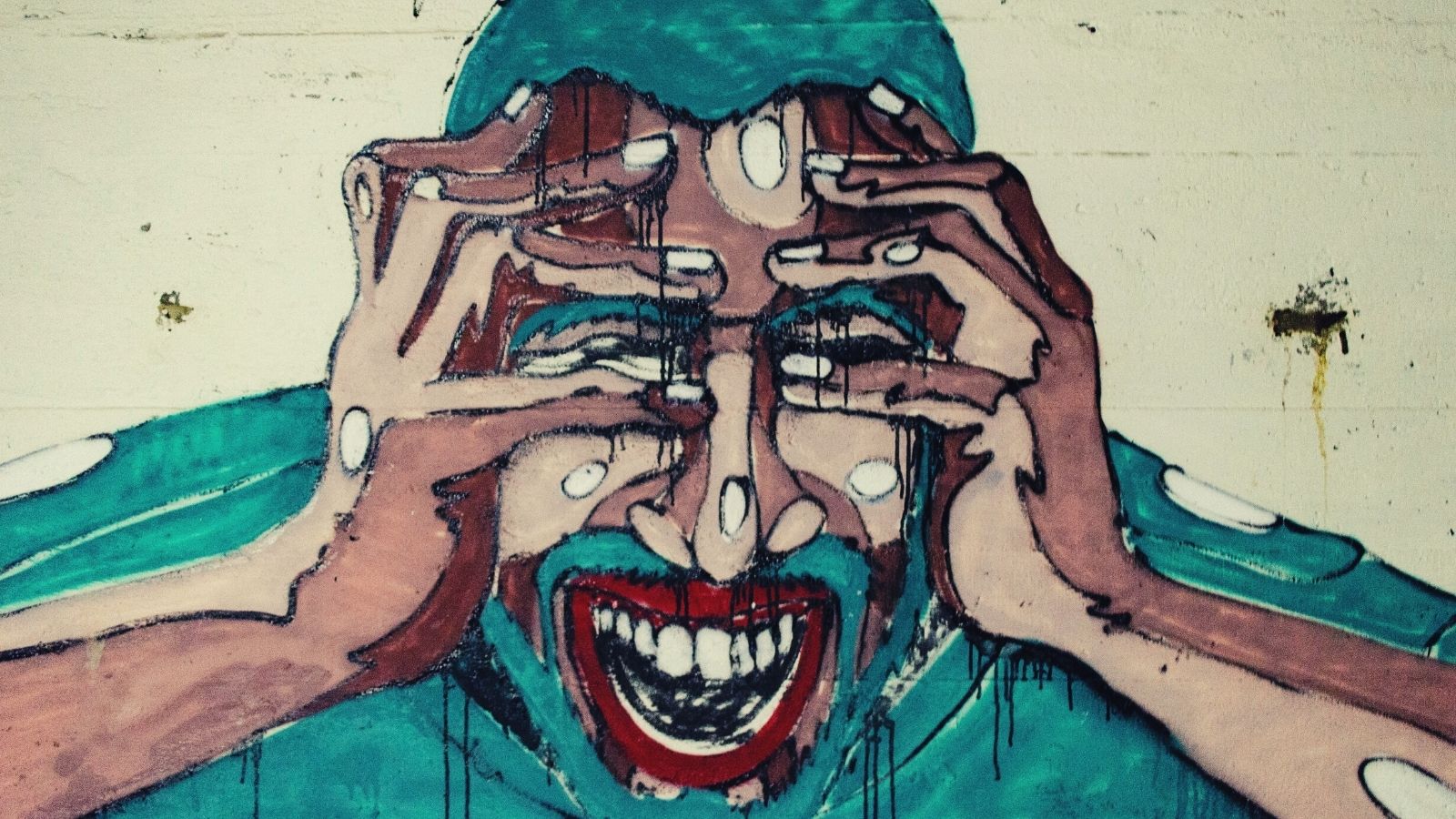 A painting of a man holding his head in pain
