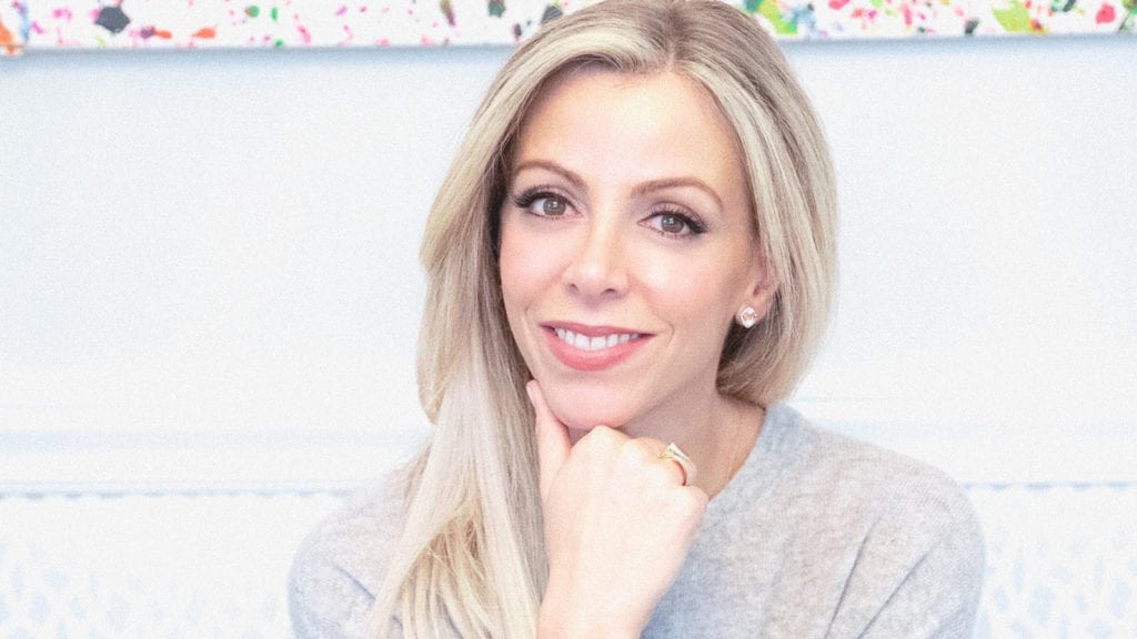 10 Influential Women in Cannabis — Happy International Women's Day | Culture | My Supply Co. A portrait of Casey Georgeson of Saint Jane Beauty in front of a white wall.