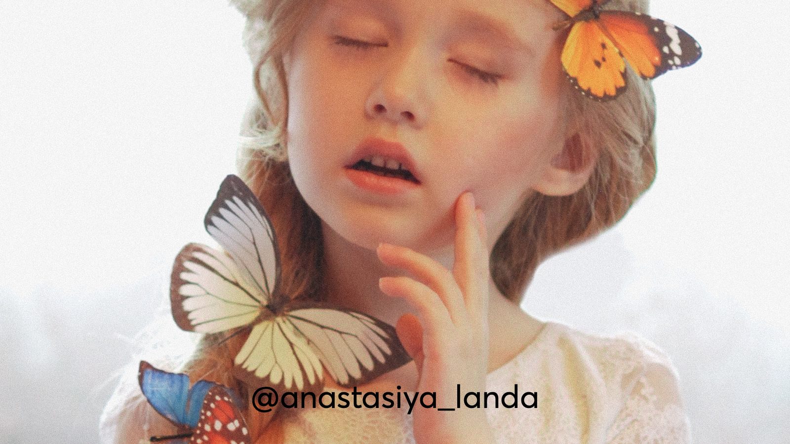 A photograph of a small child with butterflies all over her face, a concept of cannabis in paediatrics.