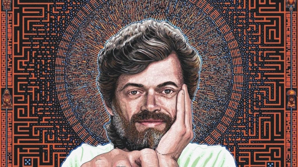 5 Revolutionaries of the Psychedelic Movement: Who’s Behind the Scenes? | Culture | My Supply Co. A drawing of Terrence McKenna holding his head in his hands with a halo and psychedelic patterns behind him.