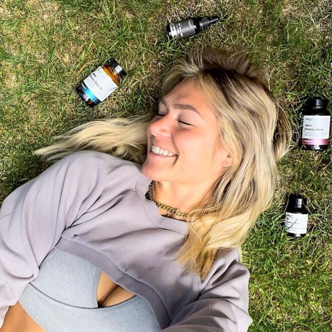 Sam Laying Next To Brain Stack Nootropic Psilocybin Microdose Capsules by My Supply Co_