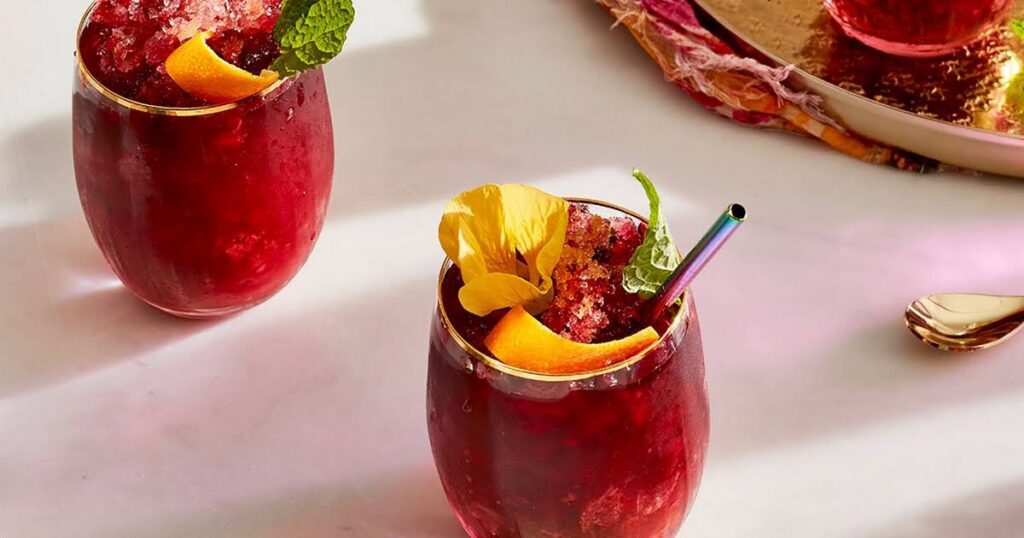 A photograph of two glasses of hibiscus sangria for an article on cannabis mocktail recipes