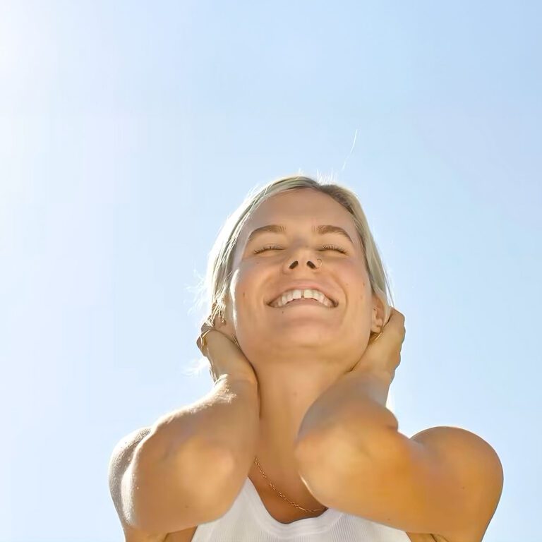 Blonde Woman Smiling for Article About Psilocybin and Ketamine for Major Depressive Disorder (MDD)