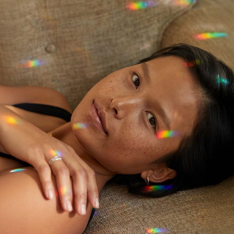 Calm Woman for Article About Difference Between Classic Psychedelics (Psilocybin, LSD, DMT, Mescaline)